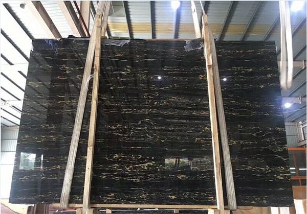 black marble tiles shower Italy Portoro